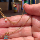 Stainless Steel gold toned Pretty little baby blue Flower Necklace