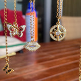 Stainless Steel gold plated DIVINELY GUIDED rhinestone compass necklace