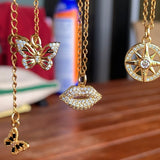Stainless Steel gold plated smooches rhinestone lip Necklace