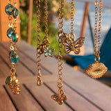 Stainless Steel gold toned Pretty little baby blue Flower Necklace