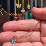 Stainless Steel gold toned Pretty little baby blue Flower Necklace