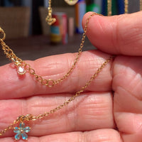 Stainless Steel gold toned Pretty little baby blue Flower Necklace