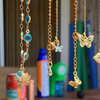 Find your center crystal Lotus flower rhinestone compass and Aqua blue faceted chain Necklace
