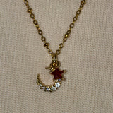 Stainless Steel gold plated rhinestone bedazzled crescent moon lightening rod and garnet red crystal star Necklace