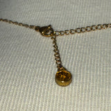 Real switch blade opens Stainless Steel gold plated Necklace with yellow rhinestone