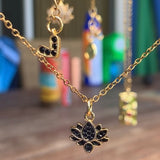 Stainless Steel gold plated tiny lotus REBIRTH black cz FLOWER Necklace