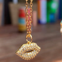 Stainless Steel gold plated smooches rhinestone lip Necklace