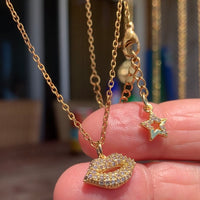 Stainless Steel gold plated smooches rhinestone lip Necklace