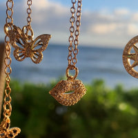 Stainless Steel gold plated smooches rhinestone lip Necklace