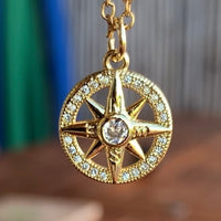 Stainless Steel gold plated DIVINELY GUIDED rhinestone compass necklace