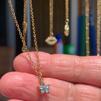 Stainless Steel gold toned Pretty little baby blue Flower Necklace