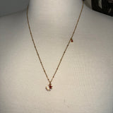 Stainless Steel gold plated rhinestone bedazzled crescent moon lightening rod and garnet red crystal star Necklace