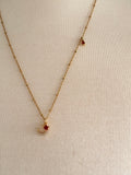 Stainless Steel gold plated rhinestone bedazzled crescent moon lightening rod and garnet red crystal star Necklace