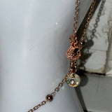 Rhinestone bedazzled crescent moon adjustable rose gold and clear AB crystal fingerbang hand chain