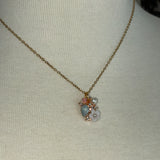 Stainless Steel gold plated bedazzled crystal rhinestone encrusted floral Necklace