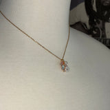 Stainless Steel gold plated bedazzled crystal rhinestone encrusted floral Necklace