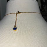 Real switch blade opens eagle themed Stainless Steel gold plated Necklace with blue rhinestone dangle